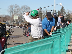 Duffers were swinging into spring at Shooters Family Golf Centre on Main Street. (KEVIN KING/Winnipeg Sun)