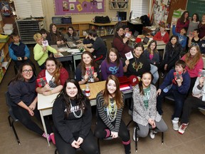 These 36 Grade 8 students conceptualized, recorded and released an EP, "The Problem", last week as part of the arts-education program DarkSpark at Quinte Mohawk School in Tyendinaga Mohawk Territory, Ont. (March 12, 2015). - Jerome Lessard/Belleville Intelligencer/QMI Agency