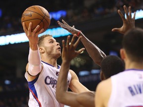 Los Angeles Clippers forward Blake Griffin (32) goes to the basket against the Toronto Raptors at Air Canada Centre. (Tom Szczerbowski-USA TODAY Sports)