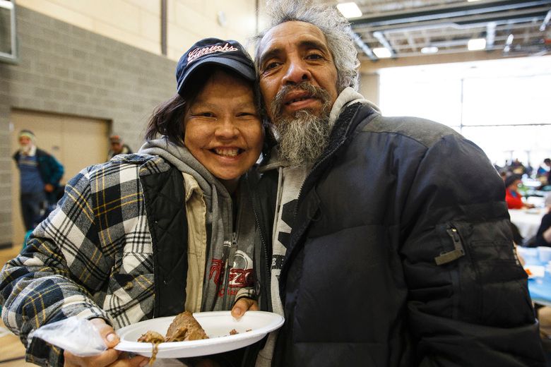 Hundreds line up for free roast beef dinner at Boyle Street Plaza