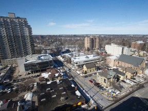 A view of the northwest corner of Talbot St. and Dufferin Ave., where the sites surrounded by yellow have been sold to make way for a highrise residential development in downtown London. (CRAIG GLOVER, The London Free Press)