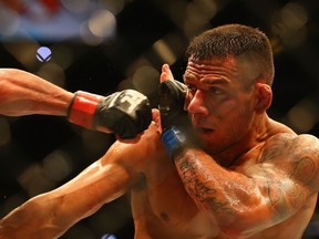 Rafael dos Anjos in the Lightweight Title bout during the UFC 185 event at American Airlines Center on March 14, 2015 in Dallas, Texas. (Ronald Martinez/Getty Images/AFP)
