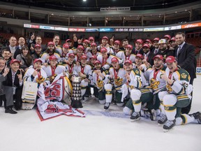 The Alberta Golden Bears celebrate after winning the University Cup in Halifax on March 15, 2015. Alberta defeated New Brunswick to capture their second consecutive CIS men’s hockey crown. Photo by Mona Ghiz
