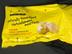 A bag of "Naturally Imperfect" russet potatoes are pictured in London, Ont., on March 15, 2015. (Mike Hensen/QMI Agency)
