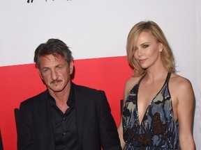 Actors Charlize Theron and Sean Penn attend the premiere of Open Road Films' 'The Gunman' at Regal Cinemas L.A. Live on March 12, 2015 in Los Angeles, California.  Jason Merritt/Getty Images/AFP