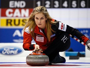 Canada's skip Jennifer Jones delivers a stone during their curling round robin game against Russia at the World Women's Curling Championship in Sapporo March 16, 2015. (REUTERS/Thomas Peter)