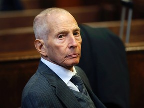 Real estate heir Robert Durst appears in a criminal courtroom for his trial on charges of trespassing on property owned by his estranged family, in New York, in this Dec. 10, 2014 file photo. Durst has been arrested in New Orleans on a murder warrrant issued by Los Angeles County, the Orleans Parish Sheriff's Office said March 16, 2015. (REUTERS/Mike Segar/Files)