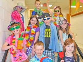 Showing off their best beach wear were, from left, back row: Noelle McLellan, Steven Rohfritsch, and Allyson Daum. Middle row: Sadie Josling, Sarah O'Rourke, Ethan Meinen and Taylor Fraser. Front row: Bryce Dixon and Mila Dewar. KRISTINE JEAN/MITCHELL ADVOCATE