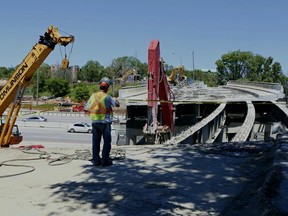 A view of the work being done to replace the Lees Avenue overpass of the Queensway in Ottawa on Thursday June 19, 2014. The MTO is looking at repairing 23 Queensway bridges. Errol McGihon/Ottawa Sun/QMI Agency