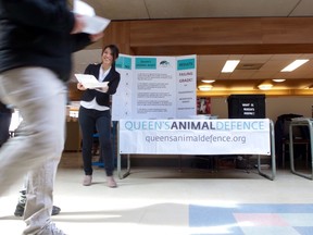 Members of Queen's Animal Defence hand out information about animal research on campus. (Ian Elliot/The Whig-Standard)