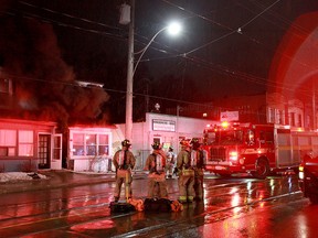 Fire crews at the scene of a fatal fire on Gerrard St. near Greenwood Ave. Monday, March 16, 2015. (John Hanley photo)
