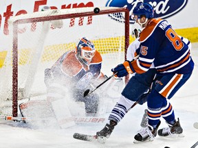 Edmonton's goalie Ben Scrivens (30) stops Toronto's Nazem Kadri (43) during the third period of the Edmonton Oilers' NHL hockey game against the Toronto Maple Leafs at Rexall Place in Edmonton, Alta., on Monday, March 16, 2015. The Oilers won 4-1. Codie McLachlan/Edmonton Sun/QMI Agency