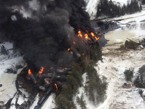 Smoke rises from fires caused by the derailment of a CN Railway train carrying crude oil near the northern Ontario community of Gogama, Ontario in this March 7, 2015 handout photo obtained by Reuters from Transport Safety Board of Canada (TSBCanada) March 9, 2015. The derailment, which occurred March 7, is CN's second in the region in just three days and the third in less than a month. It was the latest in a series of North American derailments involving trains hauling crude oil. Photo taken March 7, 2015. REUTERS/TSBCanada/Handout via Reuters