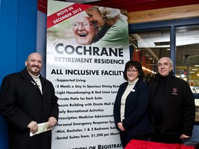 Mayor Peter Politis,  CDSSAB Area Manager Lee-Ann St. Jacques, and David Butler, Financial Controller and Business Manager for CGV Builders pose during the CGV Builders Cochrane Crunch sponsor night on Feb 20th at the Tim Horton Event's Centre. CGV announced the new Cochrane Seniors Complex that night.