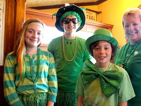Hannah McLellan, 12, Blake Brand, 13, and Hayden McLellan, 9, were dressed up for a St. Patrick's Day lunch with their grandmother Jane McLellan at Paddy Flaherty's in Sarnia Tuesday. The family were among dozens ringing in March 17 at the Irish establishment. (TYLER KULA, The Observer)