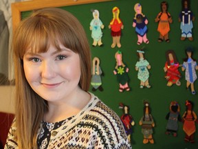 Leah Combs is the president of the Queen's Native Students' Association, which is holding its Aboriginal Awareness Week, with special events all week and a forum on Thursday discussing the issue of missing and murdered aboriginal women. In the background are dolls representing the women and girls. (Michael Lea/The Whig-Standard)