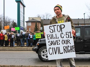 Barrie's Shane Dennis joined dozens of other protesters outside MP Patrick Brown's office Saturday to protest Bill C-51. Similar protests were held nationwide.

QMI AGENCY