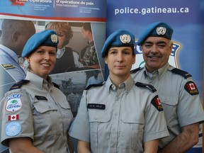 Gatineau police officers (from left) Const. Sonia Loiseau, Sgt. Marie Eve Helie and Const. Pierre Lanthier head off to serve with the UN in Haiti for one year starting March 24.DOUG HEMPSTEAD/Ottawa Sun