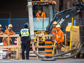 Paid duty Toronto Police officer at a construction site on Lower Sherbourne St. in Toronto Monday, March 16, 2015. (Ernest Doroszuk/Toronto Sun)