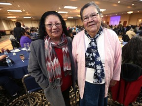 Bertha Travers (left) and Bertha Sumner were among the community elders who attended the Victoria Inn in Winnipeg to discuss the flood of 2011, and the ongoing impact on several communities Tuesday, March 17, 2015.