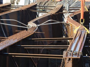 Buckled steel girders are seen at the 102 Avenue Bridge construction site on Tuesday. David Bloom, Edmonton Sun photo
