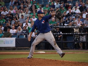 Drew Hutchison throws against the Yankees in Tampa last night. The Jays starter went four innings, giving up two runs. Mike Rutsey thinks it would be wise to start Hutchison against the Yankees in New York on opening day.(Eddie Michels/photo)