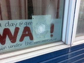 Ottawa cops are investigating after a bullet was fired into the window of this Grant St. home. (DOUG HEMPSTEAD Ottawa Sun)