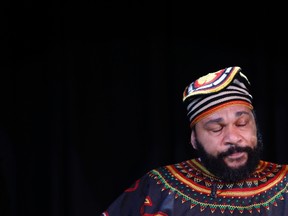 File picture shows French comedian Dieudonne M'Bala M'Bala, also known as just "Dieudonne", as he attends a news conference at the "Theatre de la Main d'or" in Paris January 11, 2014. 
 REUTERS/Gonzalo Fuentes/Files