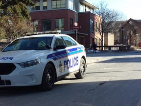 An Ottawa Police cruiser sits along University Private on the Ottawa U campus Wednesday morning after a stabbing at the school's campus bar. (COREY LAROCQUE Ottawa Sun)