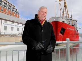 Chris West, the chair of the board of the Marine Museum of the Great Lakes in front of the museum and museum's ship Alexander Henry on Wednesday. (Ian MacAlpine/The  Whig-Standard)