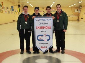 Lockerby Composite School skip Tanner Horgan (right) poses with the OFSAA championship banner with vice and younger brother Jacob Horgan, second Patrick Huska and lead Ethan Urban. Tanner Horgan was named this week's Cambrian College/Sudbury Star High School GameChanger Award winner for leading the rink to the provincial title.