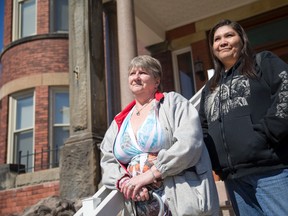 Clients Joanne Porteous, left, and Lori Elm, shown inside My Sisters? Place, are worried about reduced hours at the shelter. ?I feel safe when I?m here,? said Elm. (CRAIG GLOVER, The London Free Press)