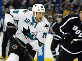 San Jose Sharks centre Joe Thornton (19) skates with the puck as Tampa Bay Lightning defenceman Eric Brewer (2) defends during NHL action at Amalie Arena. (Kim Klement/USA TODAY Sports)