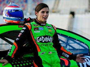 Danica Patrick, driver of the #10 GoDaddy Chevrolet, stands on the grid during qualifying for the NASCAR Sprint Cup Series Oral-B USA 500 at Atlanta Motor Speedway on Aug. 29, 2014 in Hampton, Ga.  (Jeff Curry/Getty Images/AFP)