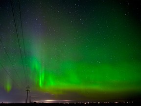 The largest recorded solar particle eruption in nearly two decades gave much of Canada a rare treat this week, with cities as far south as Toronto reporting seeing the Northern Lights. Caused by charged particles thrown out by explosions on the surface of the sun glowing high in the earth's atmosphere, skies near Crossfield, Alta. were lit up with the dazzling celestial show at 2:00 a.m. on Thursday, March 18. Bryan Passifiume/Calgary Sun/QMI Agency