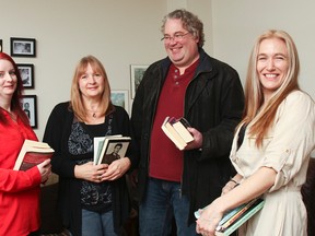 Four local authors, from left, Liz Strange, Marlene Smith, Barry King and Delina MacDonald, have banded together to organize the Limestone Genre Expo. With a focus on Canadian genre fiction, the one-day event will take place at the Ongwanada Resource Centre on July 25.
(Julia McKay/The Whig-Standard)