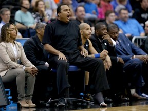 Head coach Ron Hunter of the Georgia State Panthers coaches from a chair during the second round of the 2015 NCAA Men's Basketball Tournament at Jacksonville Veterans Memorial Arena on March 19, 2015 in Jacksonville, Florida. Hunter injured his Achilles last week during the Sun Belt Conference tournament championship game. (Mike Ehrmann/Getty Images/AFP)