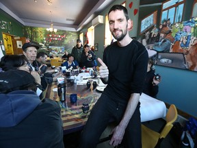 Thumbs up from Sunshine House project coordinator JD Ormond during drop-in time on Wed., March 18, 2015. JD and the Sunshine Band, which includes community participants from the drop-in centre serving street-involved and homeless people, will play a concert at The Handsome Daughter on Friday to raise funds for the repair and upkeep of its van.