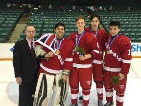 Hayden Davis, centre, poses with teammates after winning gold at the Canada Winter Games under-16 hockey tournament in Prince George, B.C. earlier this month. Davis is among the top-ranked players heading into the 2015 OHL Priority Selection. The Sudbury Wolves own the first-overall pick in the draft.