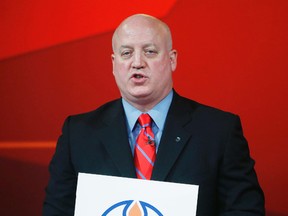 Bill Daly, shown here at the 2013 draft lottery, says the NHL has changed the lottery rules to reduce the perception that teams can tank the season to secure a top draft pick. (File Photo)