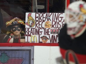 A young fan watches his new favourite player, Ottawa Senators goalie Andrew Hammond, before the Sens met the Bruins last March. Hammond led the Senators on an incredible late-season run which saw the team make the playoffs. Tony Caldwell/Ottawa Sun/QMI Agency