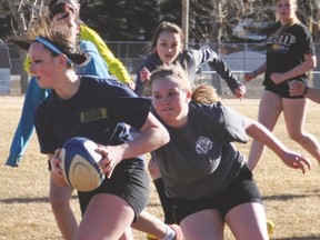 Unlike last year, Central High School does not have junior or senior varsity girls' rugby teams this season. This photo was taken at a practice last spring. Vulcan Advocate file photo