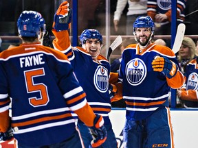 Benoit Pouliot celebrates one of two goals he scored against the Toronto Maple Leafs Monday at Rexall Place. (Codie McLachlan, Edmonton Sun)