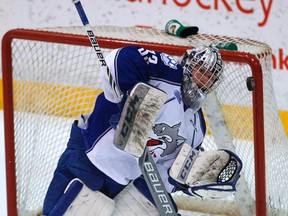 Sudbury Wolves' goalie Troy Timpano blocks a slapshot against the Peterborough Petes during first period OHL action at the Memorial Centre in Peterborough on Thursday, March 19, 2015. Clifford Skarstedt/Peterborough Examiner/QMI Agency