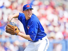 Aaron Sanchez guns the ball to first base during yesterday’s 6-3 exhibition win over the Boston Red Sox at Dunedin. (AFP)