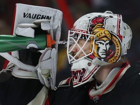 Ottawa Senators goalie Andrew Hammond cools off during second period action against the Boston Bruins at the Canadian Tire Centre on Thursday March 19,  2015.  
Tony Caldwell/Ottawa Sun/QMI Agency