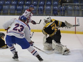 Kingston Voyageurs' Alex Stothart puts the puck past Aurora Tigers goalie Andy Munroe during Game 4 of an Ontario Junior Hockey League North-East Conference semifinal playoff series at the Invista Centre on Thursday. The Voyageurs won 7-6. (Ian MacAlpine/The Whig-Standard)