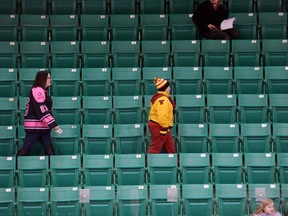 Some Belleville Bulls fans arrive early at Yardmen Arena, just in time to see their OHL team warm up Saturday, March 14, 2015, days after majority owner Gord Simmonds sold the team and announced it will be moved to Hamilton, Ont. - FILE/JEROME LESSARD/THE INTELLIGENCER/QMI AGENCY