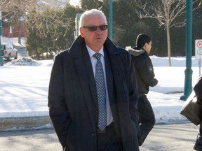 Mario Tremblay is seen walking outside the Municipal Court of Mascouche, on March 19 , 2015. (MARTIN ALARIE/LE JOURNAL DE MONTRÉAL/QMI AGENCY)