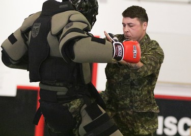 1 PPCLI soldiers demonstrate Close Quarter Combat to Soldier for A Day participants during Regimental Day in CFB Wainwright, Alta. Soldiers were wrapping up a 10-day high-impact training exercise, Exercise Patricia Villain. Grant Cree/Special to the Edmonton Sun